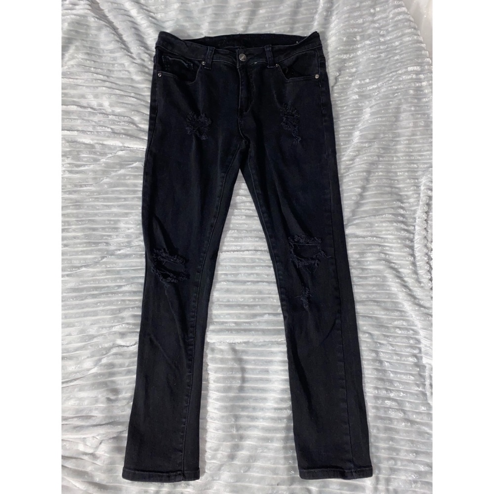 Black distressed skinny jeans